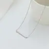 Collar con colgante largo simple europeo y americano todo a juego elegante DIY para mujer cadena de clavícula brillante de acero de titanio al por mayor