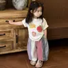 Camiseta de Manga Curta para Meninas Ningli Verão Novo Estilo Moda Infantil Solta e Confortável Gola Redonda Pulôver Roupa de Bebê