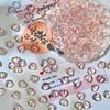 Venta al por mayor de cuentas de vidrio con forma de corazón de 10 mm con agujero recto, materiales para hacer joyas, pulseras, tocados y horquillas.