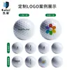 Pelota de golf caiton de dos colores hecha a medida en la fábrica de origen, pelota de práctica de putting de doble capa en blanco y negro con color y logotipo personalizados