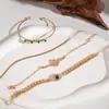 Moda Joyería Transfronteriza Nicho Pulsera de Gemas Ojos Verdes Incrustada con Diamantes Set Personalizado Pulsera Abierta en Forma de Serpiente Juego de Cuatro Piezas para Mujeres