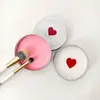 Jabón limpiador suave y delicado para brochas y esponjas de maquillaje, jabón limpiador de belleza, almohadilla limpiadora en forma de corazón, herramienta de limpieza conveniente, venta al por mayor de fábrica