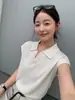 Suéter de Punto Manga Corta Cuello Solapa Estilo Maduro Elegante para Mujer 2026 Primavera/Verano Nuevo Top Pulóver Manga Corta de Gama Alta