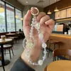 Cadenas para Teléfono, Dijes para Bolsos, Llaveros y Cordones para Teléfono Hechos a Mano con Perlas, Estrellas y Corazones, de Moda y de Alta Gama al por Mayor