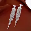 Aretes de plata con pasador, con diamantes y circonitas, diseño de borla redonda, sensación de lujo ligero y alta gama, aretes de diseño europeo y americano elegantes
