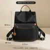 Bolsa de Ombro Dupla Transfronteiriça Nylon Casual para Viagem Leve para Computador Mochila Bolsa Escolar para Ensino Fundamental, Médio e Universitário Atacado