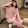 Pijama nuevo de manga larga para mujer primavera, otoño e invierno caricatura lindo rojo en línea se puede usar fuera del traje lote de fábrica de una generación de cabello