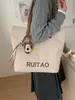 Bolso de Hombro Tote Retro de Nicho Nuevo para Mujer Primavera 2026, Adecuado para Viajes al Trabajo y Clases, Bolso de Mano de Lona de Gran Capacidad