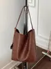 Bolso de mano tejido con patrón transfronterizo para mujer, nuevo bolso de hombro único de nicho 2026 para mujer, bolsa de mano tote vintage versátil de gran capacidad