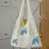 Bolsa de punto temu transfronteriza bolsa tejida a mano hueca vintage bolsa de hombro tortuga azul bolso de mano para mujer bolsa de compras