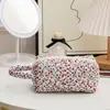 Suministro transfronterizo gran capacidad estilo coreano bolsa de cosméticos portátil bolsa de mamá bolsa de almacenamiento floral bolsa de pañales acolchada bolsa para labiales