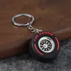 Ventas directas de fábrica de accesorios de Temu y Shein, exclusivamente para comercio electrónico transfronterizo, con un gran stock de llaveros personalizados para coche y pequeños regalos para hombres.