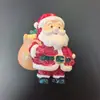 Ímãs de geladeira com tema de Natal apresentando Papai Noel, árvores de Natal e renas, para decoração de casa; meias de rena com propriedades magnéticas