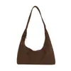 Bolsa feminina grande vintage, nova coleção outono 2026, design casual de nicho, bolsa de ombro e transversal, bolsa de bolinho para o dia a dia