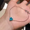 Mar Azul, Coração Azul! Pulseira de Coração com Zircônia Azul, Estilo Simples e Sofisticado, Fresca e Moderna, Acessório de Mão Versátil
