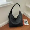 Bolsa tote de couro macio com textura tecida feminina novo estilo 2026 grande capacidade para o dia a dia bolsa de ombro único toque de luxo bolsa de axila com temperamento