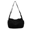 Bolsa de lona transfronteriza para mujer, nuevo modelo 2026, bolso de hombro casual versátil, bolso cruzado deportivo ligero de moda para el trabajo