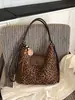 Bolsa de ombro versátil com estampa de leopardo retrô para o dia a dia, um acessório estiloso e prático para mulheres, com um toque de luxo.