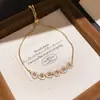 Pulsera de corazón rosa dulce con un temperamento suave, diseño exquisito y único, accesorio simple, moderno y versátil
