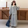 Conjunto de Moletom Falso Duas Peças para Meninas Outono 2026 Novo Estilo Meninas Maiores Conjunto Casual Esportivo Elegante de Duas Peças Primavera e Outono