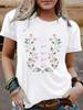 Em estoque Europeu e Americano gola redonda moda estampa de planta top camiseta feminina Amazon em estoque solta manga curta comércio exterior