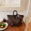 Bolsa de palha tecida, grande capacidade, bolsa de mão de moda nova 2026 para mulheres, bolsa de ombro versátil, atacado