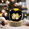 Venta al por mayor de fábrica serie navideña luminosa 3D bola de cristal adornos de escritorio luz nocturna para enviar a amigos caja sorpresa regalos de cumpleaños