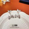 Europa y Estados Unidos viento frío raya geométrica redonda metal pendientes moda mujer simple temperamento pendientes fabricantes pendientes al por mayor