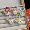 Lindo llavero de Danza del León de Dibujos Animados de Año Nuevo con Cascabel para Niñas, Parejas y Mejores Amigos - Accesorio para Bolso, Colgante, Decoración, Regalo