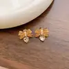 Novos Brincos de Coração de Amor com Laço Borboleta Vazado e Pérola Embutida Personalidade de Nicho Doce Fresco Estilo Ins Moda Fresca Doce Orelha