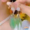 Brincos de pétalas verdes estilo europeu e americano 2024 feminino temperamento super fada brincos de franja longa brincos femininos pequenos e frescos