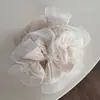 Nova versão coreana do anel de cabelo de pérola simples moda tecido anel de cabelo de intestino grosso corda de cabelo de bola de rabo de cavalo fabricantes atacado