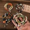Pulsera de cerámica de aleación diseño de nicho doble anillo pulsera de cerámica nuevo estilo étnico chino pulsera elástica hecha a mano