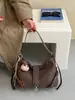 Bolso de hombro único de color liso, muy elegante y retro, modelo nuevo de otoño 2026, bolsa tote de gran capacidad para el trabajo y los desplazamientos
