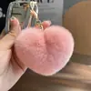 Lindo llavero de coche con forma de corazón de pelo de nutria, bola de felpa de moda, charm de mochila con forma de corazón, regalo