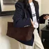 Bolsa de mano transfronteriza de gran capacidad, estilo nuevo, diseño de alta gama, adecuada para ir al trabajo, moderna y casual, bolso de mano versátil