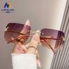 Gafas de sol sin montura para mujer estilo coreano populares en línea moda callejera foto gafas de sol sombreadas de alta calidad anti-ultravioleta