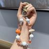 Cadena de teléfono móvil de cabeza de conejo nube acrílica directa de fábrica, llavero de cuentas hecho a mano con cierre de langosta para mujer, lindo