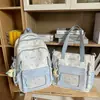 Mochila escolar azul de nuevo estilo para niñas, alto valor estético, bolso de hombro multicompartimento, juego de dos piezas para estudiantes de primaria y secundaria de 3º a 5º grado