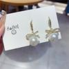 Pendientes de perlas con lazo retro para mujer 2022, nuevos y elegantes pendientes de moda para las orejas, pendientes de diamantes avanzados de celebridades de Internet.