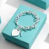 Pulsera para Pareja Etiqueta Inglesa en Forma de Corazón Marca T Cierre de Amor Ot Esmalte Azul Anillo de Corazón Melocotón Joyería Estilo Ins Transfronterizo