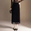 Falda lápiz negra ajustada con abertura, elegante falda midi de trabajo, nueva falda de moda de longitud media para otoño de 2026