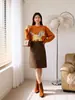 Falda de cadera de lana de color liso y diseño simple Feiyuan para mujer, nueva de otoño e invierno, estilo coreano, falda midi de lana de cintura alta con cinturón