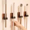 Estante para trapeador de nogal con gancho para trapeador sin perforaciones, soporte para trapeador, estante de almacenamiento fijo para montaje en pared para baño doméstico