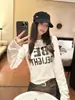 Camiseta de Manga Larga Cálida Cepillada con Estampado de Letras Baisiwang para Mujer, Otoño e Invierno, Corta, Versátil, Ajustada, Cuello Redondo, Camiseta Básica