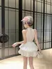 Vestido Rosa de Cuello Halter con Collar de Perlas y Parches de Malla, Corto y Esponjoso, Estilo Socialité Suave y Elegante Vestido para Cita