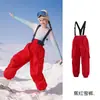 Pantalones de Esquí Nuevos para Niños Impermeables 3L Completamente Sellados Ropa de Snowboard Profesionales para Niños y Niñas Pantalones de Esquí con Peto y Puños en las Piernas