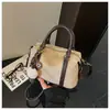 Bolsa de viaje transfronteriza para mujer, gran capacidad, nuevo estilo 2025, bolso de hombro de gamuza moderno, bolso cruzado de gran capacidad, bolsa tipo almohada