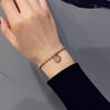 Explosiones Europeas y Americanas Aman Pulsera Redonda de Acero de Titanio Marca Redonda para Mujer No se Desvanece Estilo Coreano Simple Popular en Internet Joyería de Mano con Cuentas de Viento Frío