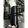Pantalones de chándal anchos con estampado de letras retro americano y tres rayas para hombre y mujer, marca de moda, holgados, casual, deportivos, versátiles, largos